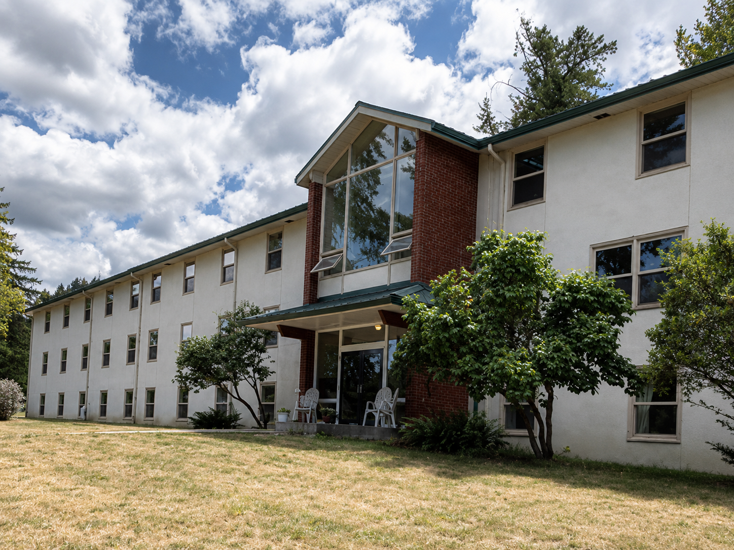 Earlier photograph of the Harmony Hall residential building; not current condition
